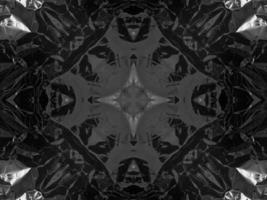 Black silver metalic kaleidoscope background. Abstract and symmetric pattern with dark vibes. photo