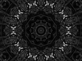 Black silver metalic kaleidoscope background. Abstract and symmetric pattern with dark vibes. photo