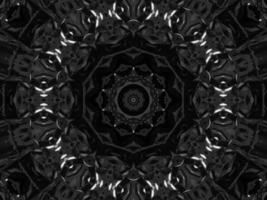 Black silver metalic kaleidoscope background. Abstract and symmetric pattern with dark vibes. photo