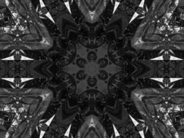 Black silver metalic kaleidoscope background. Abstract and symmetric pattern with dark vibes. photo