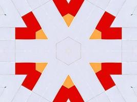 A colorful brick kaleidoscope background. Symmetric abstract and aesthetic pattern photo