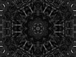 Black silver metalic kaleidoscope background. Abstract and symmetric pattern with dark vibes. photo