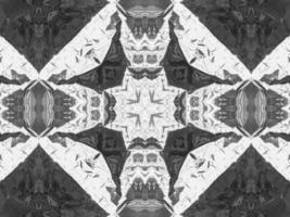 Black silver metalic kaleidoscope background. Abstract and symmetric pattern with dark vibes. photo