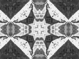 Black silver metalic kaleidoscope background. Abstract and symmetric pattern with dark vibes. photo