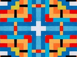 A colorful brick kaleidoscope background. Symmetric abstract and aesthetic pattern photo