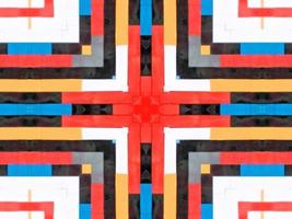 A colorful brick kaleidoscope background. Symmetric abstract and aesthetic pattern photo