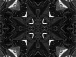 Black silver metalic kaleidoscope background. Abstract and symmetric pattern with dark vibes. photo