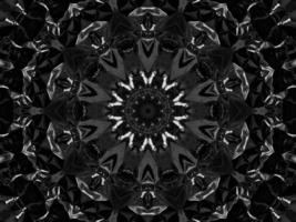 Black silver metalic kaleidoscope background. Abstract and symmetric pattern with dark vibes. photo