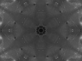 Black silver metalic kaleidoscope background. Abstract and symmetric pattern with dark vibes. photo