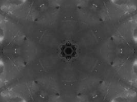 Black silver metalic kaleidoscope background. Abstract and symmetric pattern with dark vibes. photo