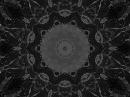 Black silver metalic kaleidoscope background. Abstract and symmetric pattern with dark vibes. photo