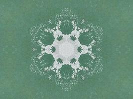 Green watercolor on the wall kaleidoscope background with abstract and unique pattern photo