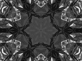 Black silver metalic kaleidoscope background. Abstract and symmetric pattern with dark vibes. photo