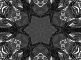 Black silver metalic kaleidoscope background. Abstract and symmetric pattern with dark vibes. photo