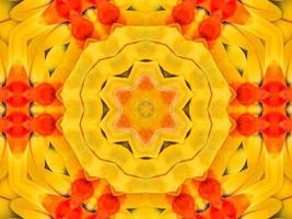 Yellow feather kaleidoscope floral pattern with some blue and red color. Abstract unique and aesthetic background. photo