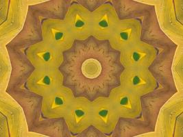 Yellow feather kaleidoscope floral pattern with some blue and red color. Abstract unique and aesthetic background. photo