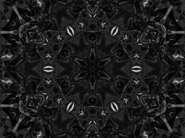 Black silver metalic kaleidoscope background. Abstract and symmetric pattern with dark vibes. photo