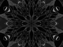 Black silver metalic kaleidoscope background. Abstract and symmetric pattern with dark vibes. photo