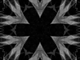 Black silver metalic kaleidoscope background. Abstract and symmetric pattern with dark vibes. photo