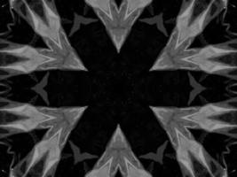 Black silver metalic kaleidoscope background. Abstract and symmetric pattern with dark vibes. photo