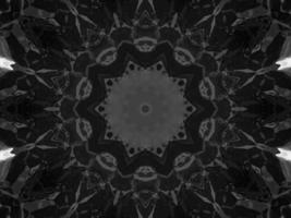 Black silver metalic kaleidoscope background. Abstract and symmetric pattern with dark vibes. photo