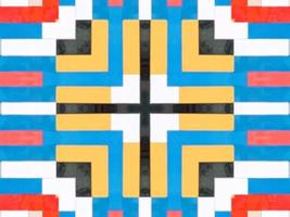 A colorful brick kaleidoscope background. Symmetric abstract and aesthetic pattern photo