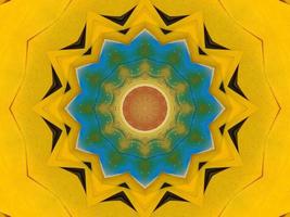 patrón floral de caleidoscopio de plumas amarillas con un poco de color azul y rojo. fondo abstracto único y estético. foto