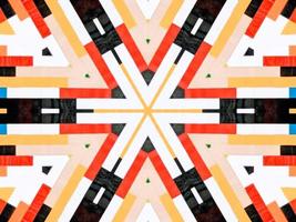 A colorful brick kaleidoscope background. Symmetric abstract and aesthetic pattern photo