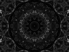Black silver metalic kaleidoscope background. Abstract and symmetric pattern with dark vibes. photo
