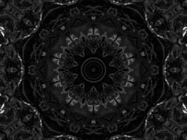 Black silver metalic kaleidoscope background. Abstract and symmetric pattern with dark vibes. photo