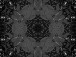 Black silver metalic kaleidoscope background. Abstract and symmetric pattern with dark vibes. photo