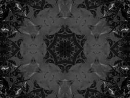 Black silver metalic kaleidoscope background. Abstract and symmetric pattern with dark vibes. photo