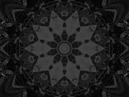 Black silver metalic kaleidoscope background. Abstract and symmetric pattern with dark vibes. photo