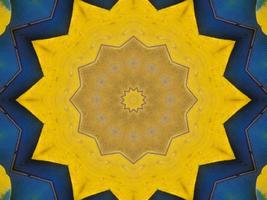 Yellow feather kaleidoscope floral pattern with some blue and red color. Abstract unique and aesthetic background. photo