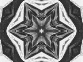 Black silver metalic kaleidoscope background. Abstract and symmetric pattern with dark vibes. photo