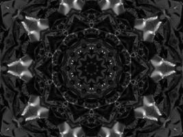 Black silver metalic kaleidoscope background. Abstract and symmetric pattern with dark vibes. photo