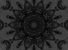 Black silver metalic kaleidoscope background. Abstract and symmetric pattern with dark vibes. photo