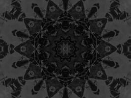 Black silver metalic kaleidoscope background. Abstract and symmetric pattern with dark vibes. photo