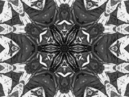 Black silver metalic kaleidoscope background. Abstract and symmetric pattern with dark vibes. photo