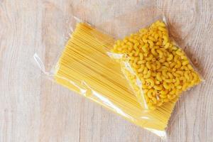 Raw spaghetti italian pasta uncooked raw Macaroni in package vermicelli pasta product dry food , non perishable food photo