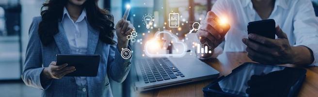 man use Laptop with cloud computing diagram show on hand. Cloud technology. Data storage. Networking and internet service concept. photo