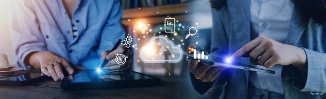 man use Laptop with cloud computing diagram show on hand. Cloud technology. Data storage. Networking and internet service concept. photo