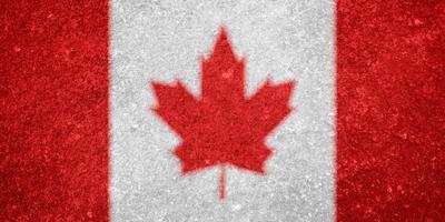 textura de la bandera canadiense como fondo foto