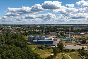 aerial view of a huge agro-industrial complex with silos and grain drying line photo