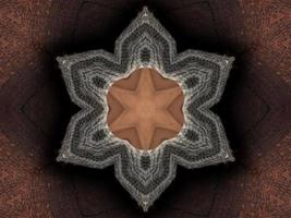 Abstract kaleidoscope background. Beautiful multicolor kaleidoscope texture. Unique kaleidoscope design. with a light brown base color and surrounded by dark brown photo