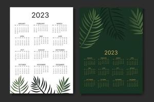 calendario mensual clásico para 2023. calendario con hojas de palma, color blanco y verde. vector