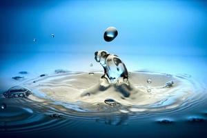 splash of water on a blue background photo