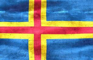 Aland Islands flag - realistic waving fabric flag photo