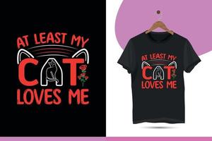 At least my cat loves me. Valentine's day cat typography t-shirt design template. Vector illustration with rose, and cat.