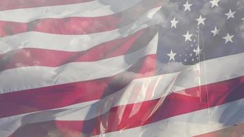 Ghosted Slow Motion American Flag Waving In Wind with Time lapse Clouds video